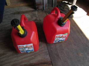 2 new plastic gas cans...