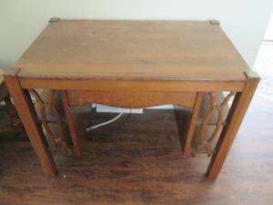 Wooden table with drawer and side s...