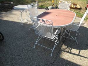 2 Patio tables and chairs...