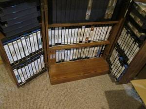 2 cabinets full of VHS tapes 23.25...