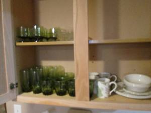 Glasses, coffee cups, plates and bo...