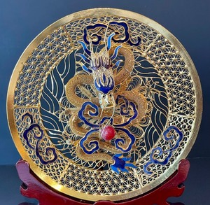 lot 15 image: Asian Inspired Decorative Golden Plate with Stand