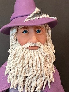 lot 51 image: Two Artisan Created Wizard Figurines