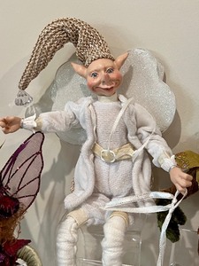lot 100 image: Fun and Whimsical Collection of Four Fairy Figurines