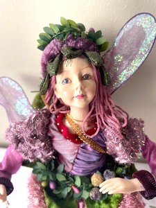 lot 144 image: Four Whimsical Posable Fairy Dolls