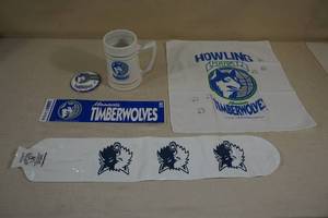 lot 46 image: Vintage Minnesota Timberwolves Items - Mug, Hanky, Button, Bumper Sticker