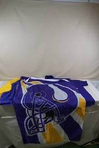 lot 50 image: Minnesota Vikings Jackets, Shirt, Flag