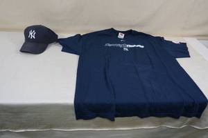 lot 57 image: New York Yankees Hat and Shirt