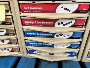 ASSORTED GROMMETSCORD PROTECTORS AND CABINET