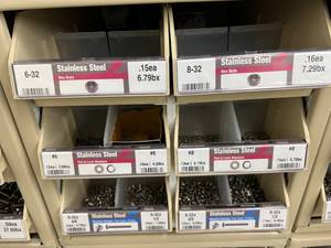ASSORTED STAINLESS STEEL SCREWSNUTSWASHERS AND CABINET