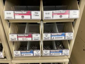 ASSORTED STAINLESS STEEL NUTSWASHERSSCREWS AND CABINET