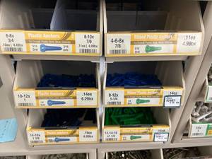 ASSORTED PLASTIC ANCHORS AND CABINET