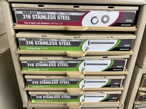 ASSORTED STAINLESS CARRIAGE BOLTS AND CABINET