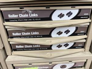 ASSORTED ROLLER CHAIN LINKS WITH CABINET