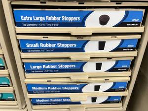 ASSORTED STOPPERS WITH CABINET