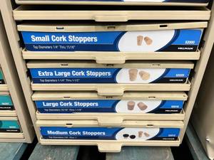 ASSORTED CORK STOPPERS WITH CABINET