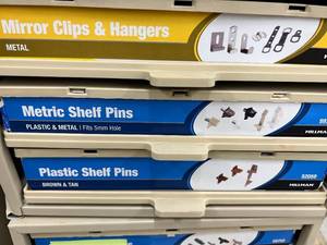 ASSORTED SHELF PINSMIRROR HANGERS WITH CABINET