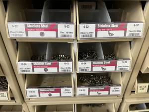 ASSORTED STAINLESS STEEL NUTS WITH CABINET