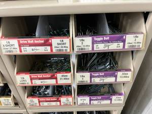 ASSORTED WALL ANCHORS AND TOGGLE BOLTS WITH CABINET