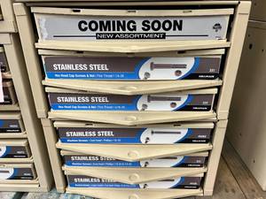 ASSORTED STAINLESS STEEL SCREWS AND NUTS WITH CABINET