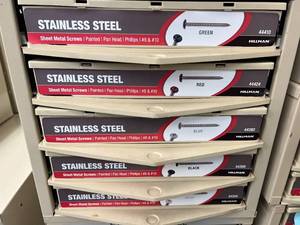 ASSORTED STAINLESS SHEET METAL SCREWS WITH CABINET