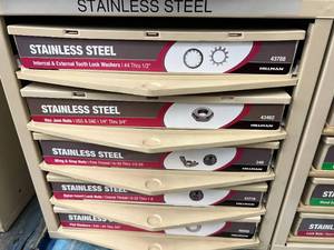 ASSORTED STAINLESS WASHER AND NUTS WITH CABINET