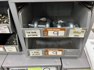 2 DRAWER CABINET WITH A COUPLE OF ANCHOR SHACKLES