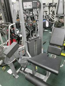 lot 14 image: Life Fitness leg extension weight m...