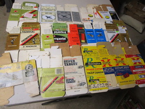 lot 118 image: Ammo boxes - empty paper Holiday, ...