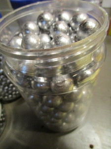lot 122 image: Jar of Lead balls .730, approx 14 l...