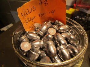 lot 124 image: Lead bullets jar of 231gr #8, appr...