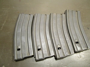 lot 176 image: Four 10rd magazines, marked 3S679...