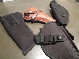 lot 226 image: Holsters - one leather...