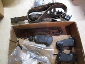 lot 311 image: Pistol grips, sling, gun parts, fla...