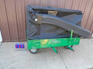 Cart bagger rear mount grass catcher for riding mowers with caster wheels. With cover & tire. As shown.