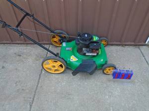 Weed Eater 5 hp Briggs & Stratton push mower. I mowed about 30 min with it. As shown.