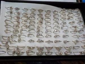 100 Cubic Zirconia Rings in a Displ...