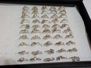 50 Cubic Zirconia Rings in a Displa...
