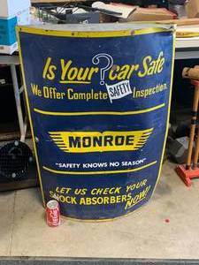 lot 11 image: Vintage Monroe Metal Sign 35x22x5