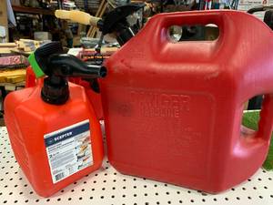lot 71 image: 2 Gallon & 5 Gallon Gas Cans