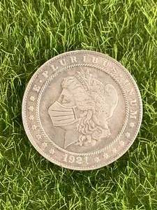 lot 77 image: Morgan Hobo COVID Coin
