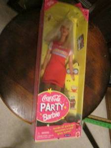 lot 12 image: Coca Cola collectible Barbie doll...