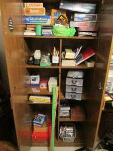 lot 14 image: Entire cabinet full of games, offic...