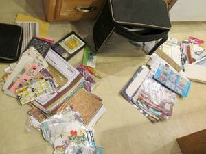 lot 26 image: Wheeled storage tote of scrap book ...