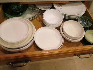 lot 38 image: Drawer full of plates and bowls...