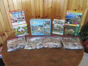 lot 114 image: Several puzzles (see photos )...