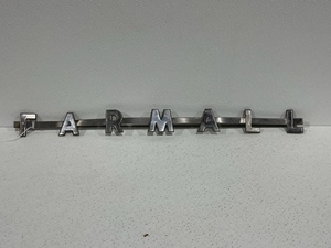 lot 52 image: Farmall Tractor Emblem