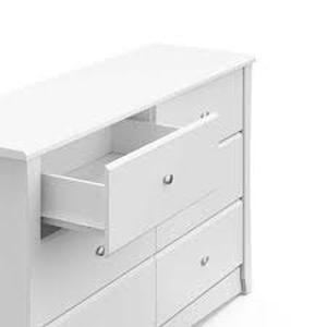 lot 43 image: Storkcraft 6-Drawer Crescent White Dresser