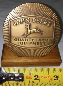 lot 42 image: John Deere Desk Plaque 1986