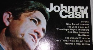 lot 76 image: (3) Johnny Cash Albums 12 in.